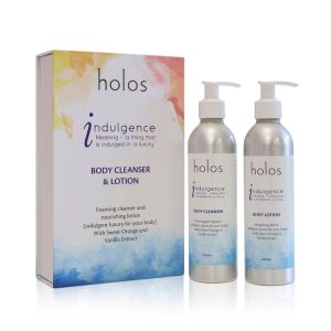 The Holos Skincare Indulgence Body Gift Set features a vibrant box housing two pump bottles of body cleanser and lotion infused with sweet orange and vanilla extracts. Perfect for a luxurious self-care ritual, this set promises to elevate your skincare routine to new heights.